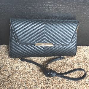 Black textured handbag